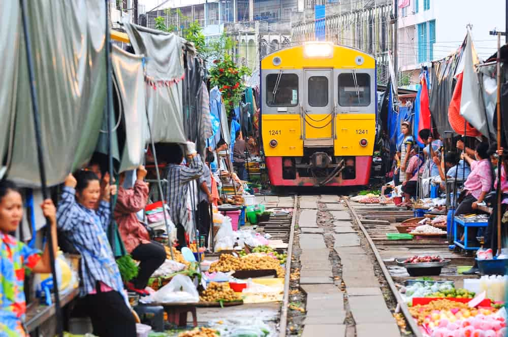 Damnoen Saduak & Maeklong Train Experience